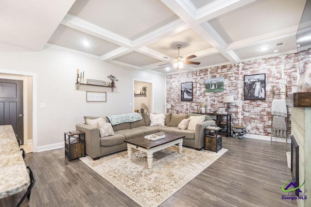 103 Cascades Ct, Bonaire, GA 31005 - living room featuring a ceiling fan, dark wood-style floors, beam ceiling, coffered ceiling, and crown molding