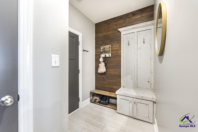 103 Cascades Ct, Bonaire, GA 31005 - mudroom with wood walls and an accent wall