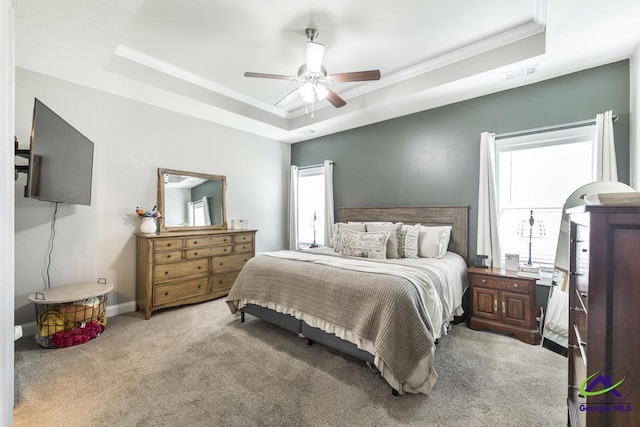 103 Cascades Ct, Bonaire, GA 31005 - bedroom featuring a tray ceiling, carpet flooring, crown molding, and a ceiling fan