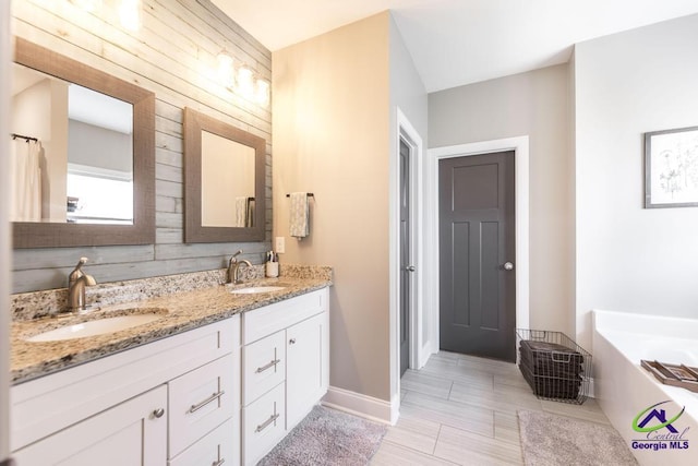 103 Cascades Ct, Bonaire, GA 31005 - bathroom featuring double vanity and a garden tub