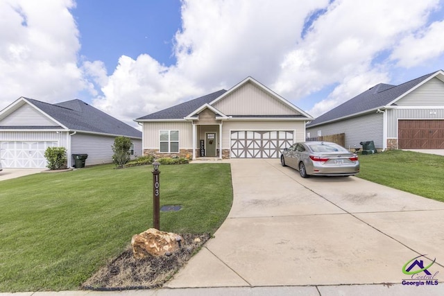 103 Cascades Ct, Bonaire, GA 31005 - craftsman-style house featuring board and batten siding, stone siding, a front lawn, and driveway