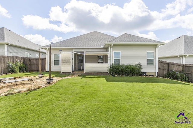 103 Cascades Ct, Bonaire, GA 31005 - rear view of property featuring a fenced backyard and roof with shingles