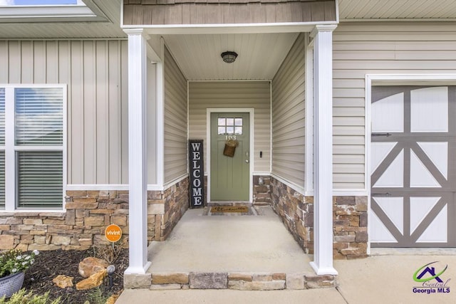 103 Cascades Ct, Bonaire, GA 31005 - view of exterior entry featuring stone siding