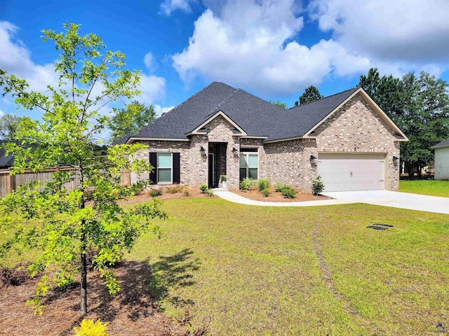 109 Raspberry Trl, Perry, GA 31069 - view of front of home featuring brick siding, driveway, an attached garage, and roof with shingles