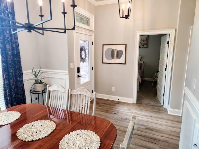 109 Raspberry Trl, Perry, GA 31069 - dining room with wood finished floors, crown molding, and a towering ceiling