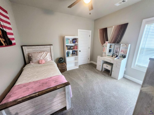 109 Raspberry Trl, Perry, GA 31069 - bedroom with light carpet, multiple windows, and a ceiling fan