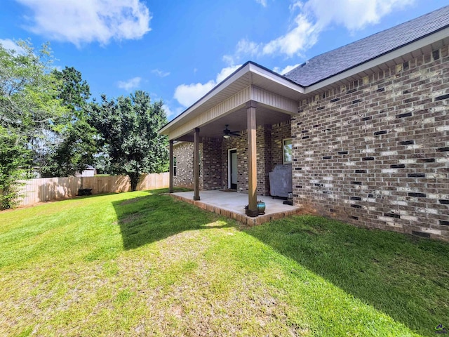 109 Raspberry Trl, Perry, GA 31069 - property entrance featuring a ceiling fan, a patio, and brick siding