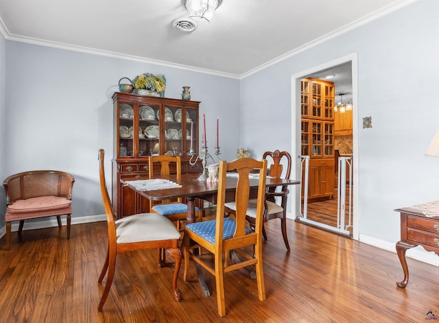 113 Chestnut Rd, Warner Robins, GA 31088 - dining space featuring wood finished floors and crown molding