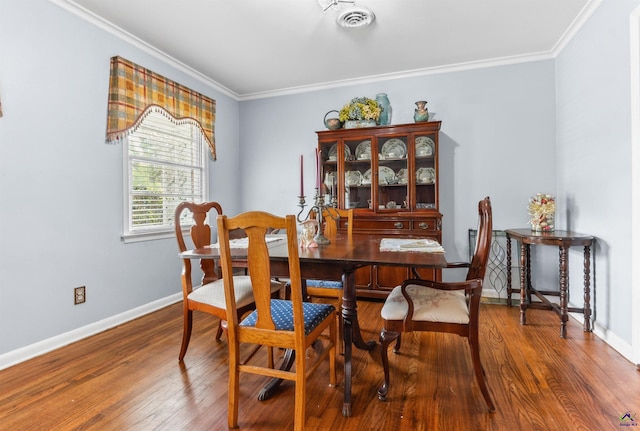 113 Chestnut Rd, Warner Robins, GA 31088 - dining space with crown molding and wood finished floors