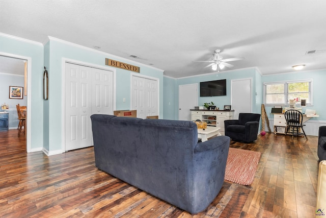 113 Chestnut Rd, Warner Robins, GA 31088 - living area featuring dark wood-style floors, a ceiling fan, and ornamental molding