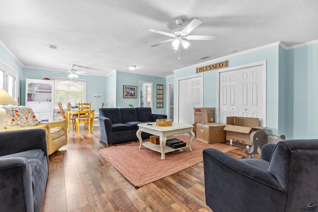 113 Chestnut Rd, Warner Robins, GA 31088 - living area with a ceiling fan, wood-type flooring, a textured ceiling, and ornamental molding