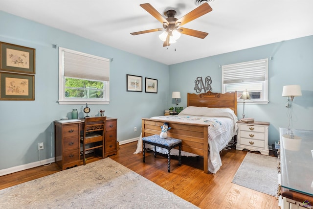 113 Chestnut Rd, Warner Robins, GA 31088 - bedroom with wood finished floors and a ceiling fan
