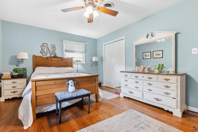 113 Chestnut Rd, Warner Robins, GA 31088 - bedroom featuring a closet, wood finished floors, and a ceiling fan