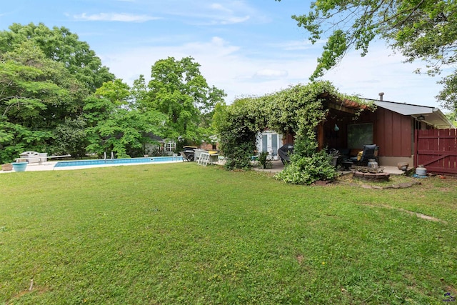 113 Chestnut Rd, Warner Robins, GA 31088 - view of yard featuring an outdoor pool and a patio area