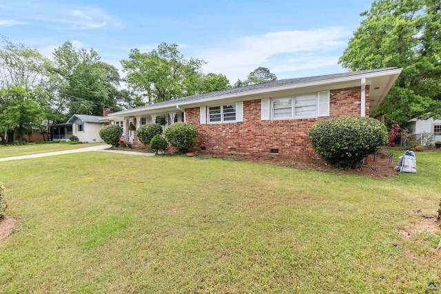 113 Chestnut Rd, Warner Robins, GA 31088 - ranch-style house with crawl space, brick siding, and a front yard