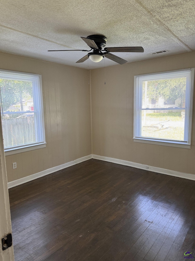 314 Arnold Blvd, Warner Robins, GA 31093 - unfurnished room with dark wood finished floors, ceiling fan, and a textured ceiling