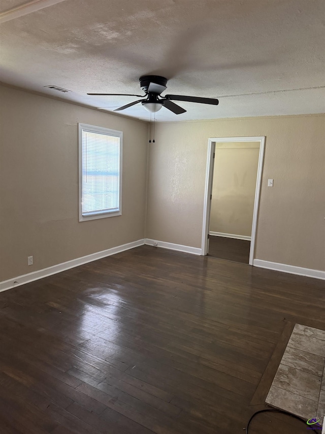 314 Arnold Blvd, Warner Robins, GA 31093 - empty room featuring ceiling fan, a textured ceiling, and dark wood finished floors
