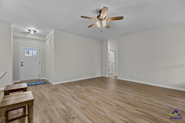 3055 Cellar Ln, Perry, GA 31069 - unfurnished living room featuring light wood-style flooring and a ceiling fan