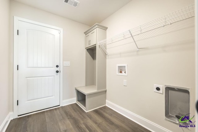 102 Sugar Creek Trl, Perry, GA 31069 - laundry area featuring hookup for an electric dryer, dark wood-style flooring, cabinet space, and hookup for a washing machine