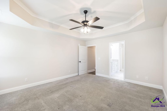102 Sugar Creek Trl, Perry, GA 31069 - carpeted empty room featuring a tray ceiling, ceiling fan, and ornamental molding