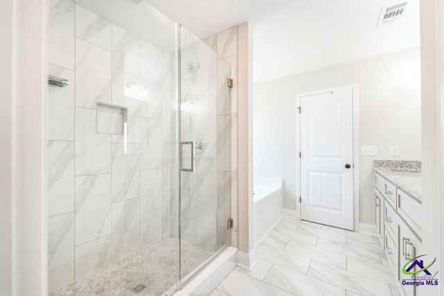 102 Sugar Creek Trl, Perry, GA 31069 - bathroom with a garden tub, a shower stall, and vanity