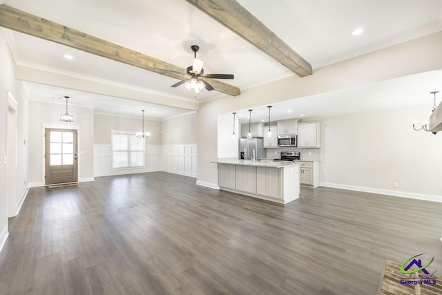 102 Sugar Creek Trl, Perry, GA 31069 - unfurnished living room featuring a chandelier, beam ceiling, a ceiling fan, dark wood-style flooring, and ornamental molding
