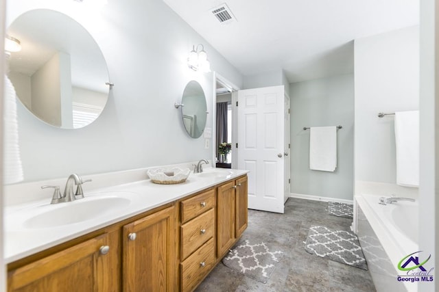 546 Grove Ln, Kathleen, GA 31047 - bathroom featuring a bath, double vanity, and stone finish flooring