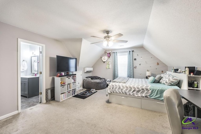 546 Grove Ln, Kathleen, GA 31047 - carpeted bedroom with a textured ceiling, lofted ceiling, ensuite bathroom, and ceiling fan