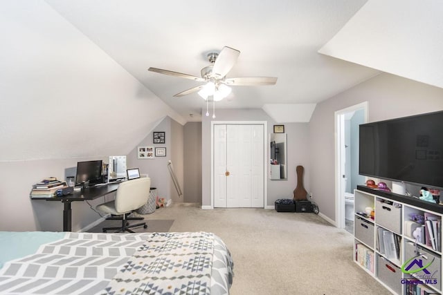 546 Grove Ln, Kathleen, GA 31047 - carpeted bedroom with vaulted ceiling, a closet, a ceiling fan, and connected bathroom