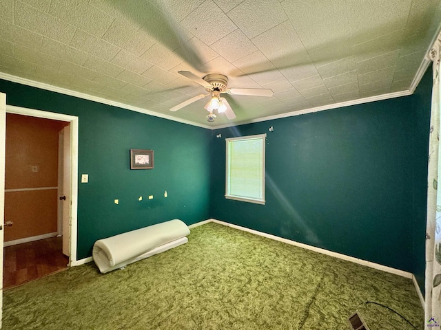 304 Mcwhorter St, Unadilla, GA 31091 - unfurnished bedroom featuring ornamental molding, carpet flooring, and a ceiling fan