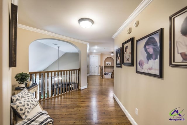109 Black Oak Ct, Byron, GA 31008 - corridor with ornamental molding, wood finished floors, and arched walkways
