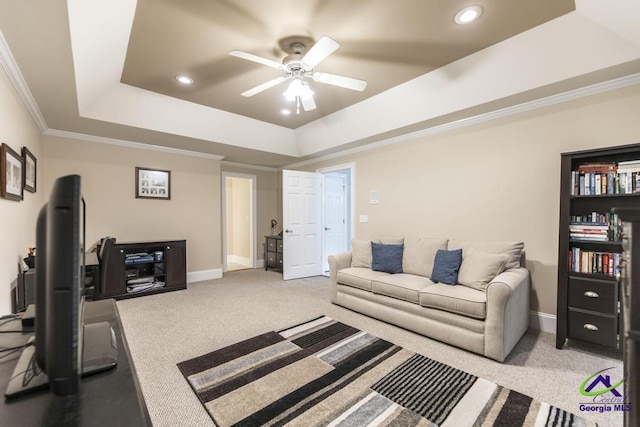 109 Black Oak Ct, Byron, GA 31008 - living area featuring a tray ceiling, ceiling fan, carpet, ornamental molding, and recessed lighting