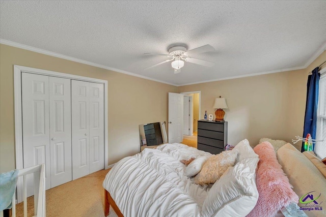 574 Shadow Moss Dr, Macon, GA 31204 - bedroom with light colored carpet, crown molding, a closet, ceiling fan, and a textured ceiling