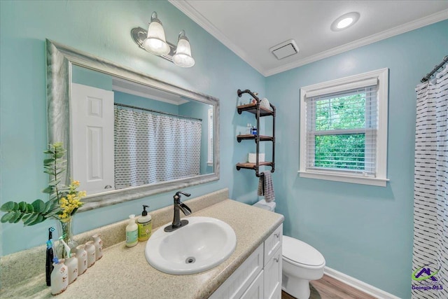 574 Shadow Moss Dr, Macon, GA 31204 - full bath featuring vanity, crown molding, wood finished floors, and a shower with shower curtain