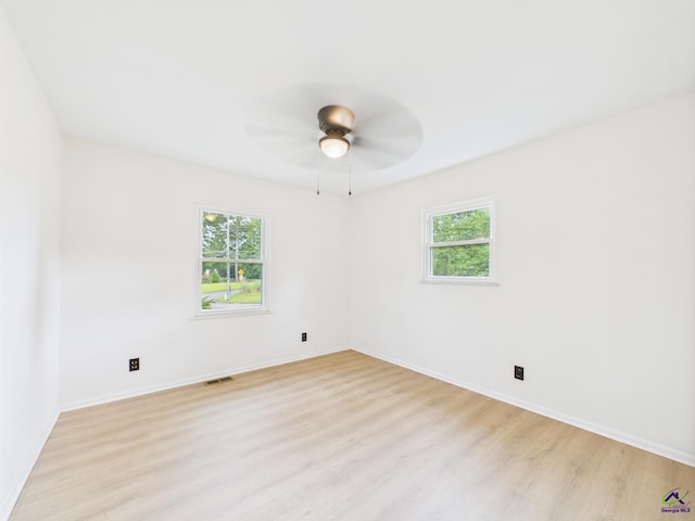 752 S Forest Lake Dr, Macon, GA 31210 - unfurnished room featuring light wood-type flooring, healthy amount of natural light, and ceiling fan
