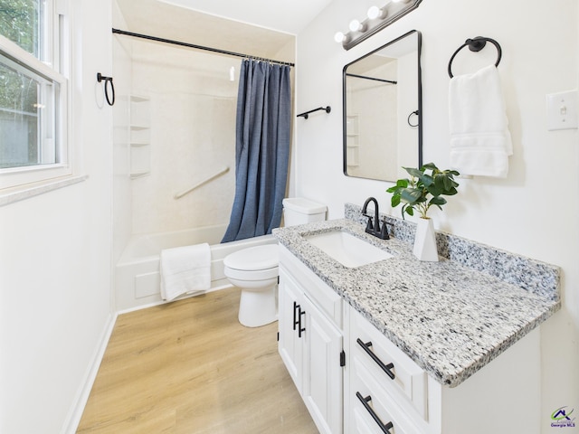 752 S Forest Lake Dr, Macon, GA 31210 - full bathroom with wood finished floors, vanity, and shower / tub combo with curtain