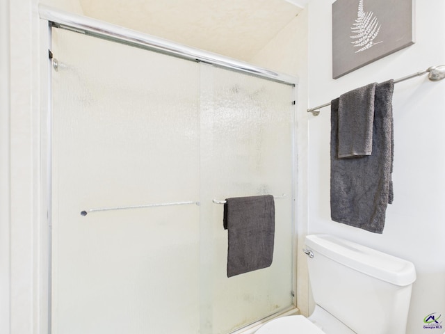 752 S Forest Lake Dr, Macon, GA 31210 - full bathroom featuring toilet and a stall shower