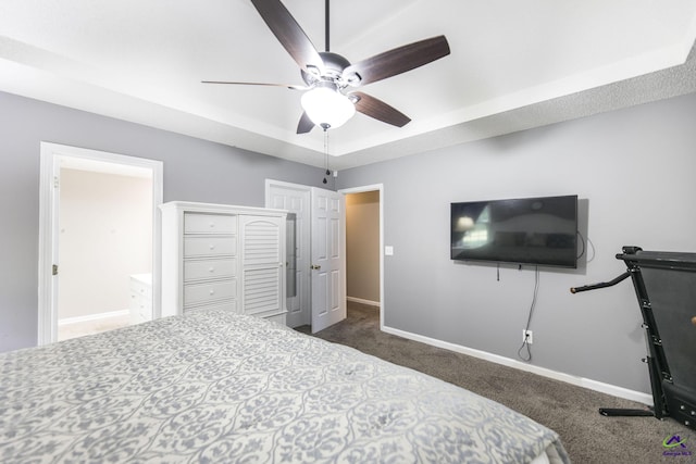 3560 S Lawrence Dr, Macon, GA 31216 - bedroom featuring dark carpet, a ceiling fan, and a closet
