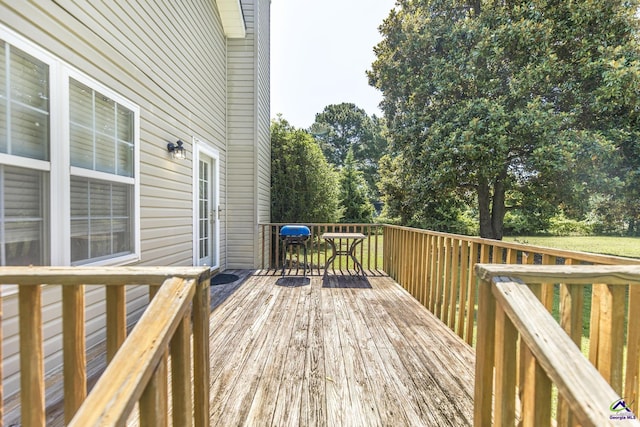 3560 S Lawrence Dr, Macon, GA 31216 - wooden deck with area for grilling and outdoor dining space