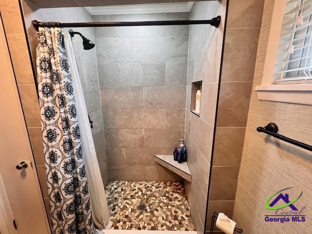234 Briarcliff Rd, Warner Robins, GA 31088 - bathroom with ornamental molding and tiled shower