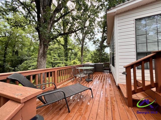 234 Briarcliff Rd, Warner Robins, GA 31088 - wooden terrace featuring outdoor dining area