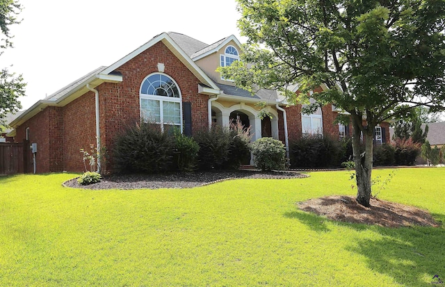 217 Wilsons Creek Bnd, Bonaire, GA 31005 - view of front facade with brick siding and a shingled roof