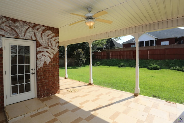 217 Wilsons Creek Bnd, Bonaire, GA 31005 - fenced backyard with a patio area and a ceiling fan