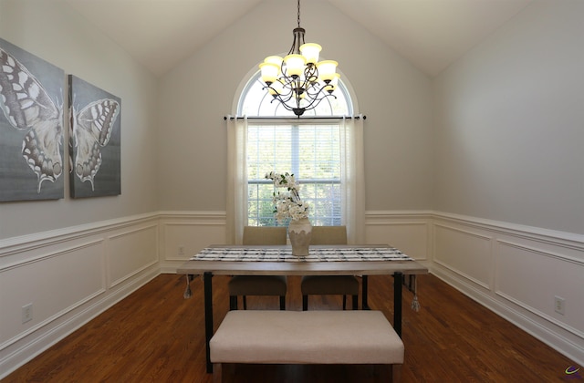 217 Wilsons Creek Bnd, Bonaire, GA 31005 - dining area featuring a chandelier, wood finished floors, healthy amount of natural light, a wainscoted wall, and lofted ceiling