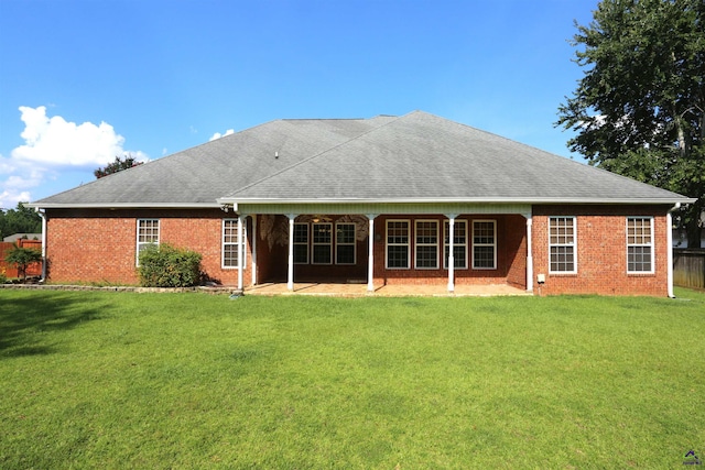 217 Wilsons Creek Bnd, Bonaire, GA 31005 - back of house with roof with shingles, a patio, and brick siding