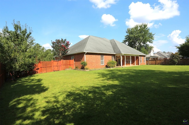217 Wilsons Creek Bnd, Bonaire, GA 31005 - back of property with a fenced backyard and brick siding