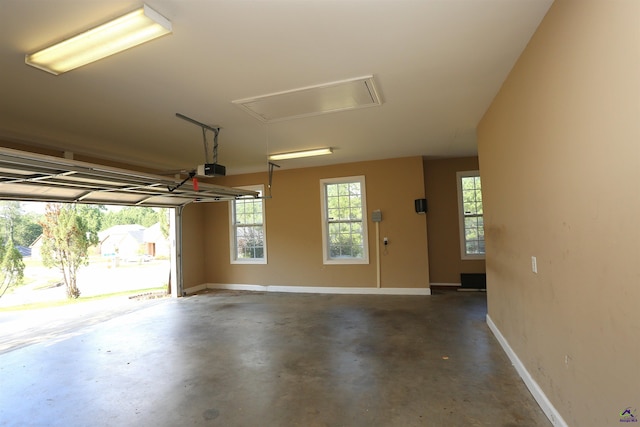 217 Wilsons Creek Bnd, Bonaire, GA 31005 - garage featuring baseboards and a garage door opener