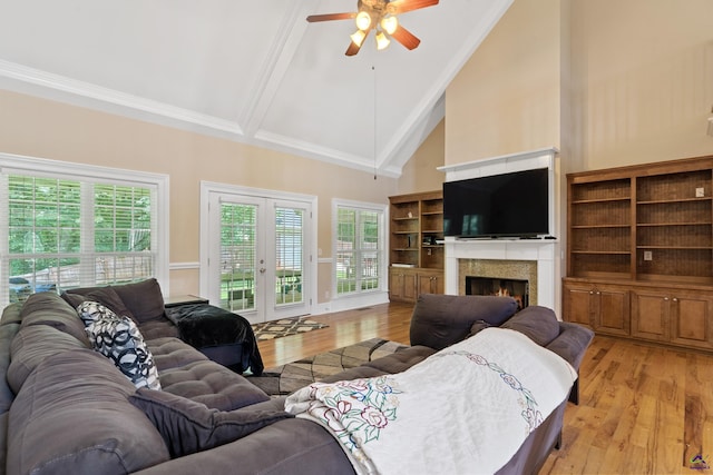 513 Litchfield, Macon, GA 31220 - living area with a ceiling fan, french doors, plenty of natural light, a warm lit fireplace, and high vaulted ceiling