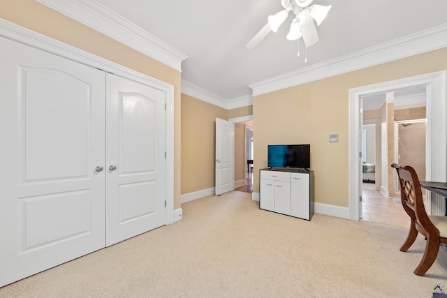 513 Litchfield, Macon, GA 31220 - bedroom with light carpet, ornamental molding, a closet, and a ceiling fan