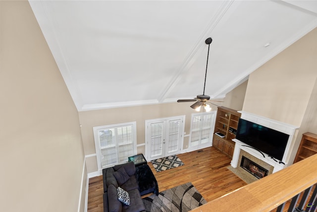 513 Litchfield, Macon, GA 31220 - living area with a fireplace with flush hearth, wood finished floors, crown molding, ceiling fan, and lofted ceiling